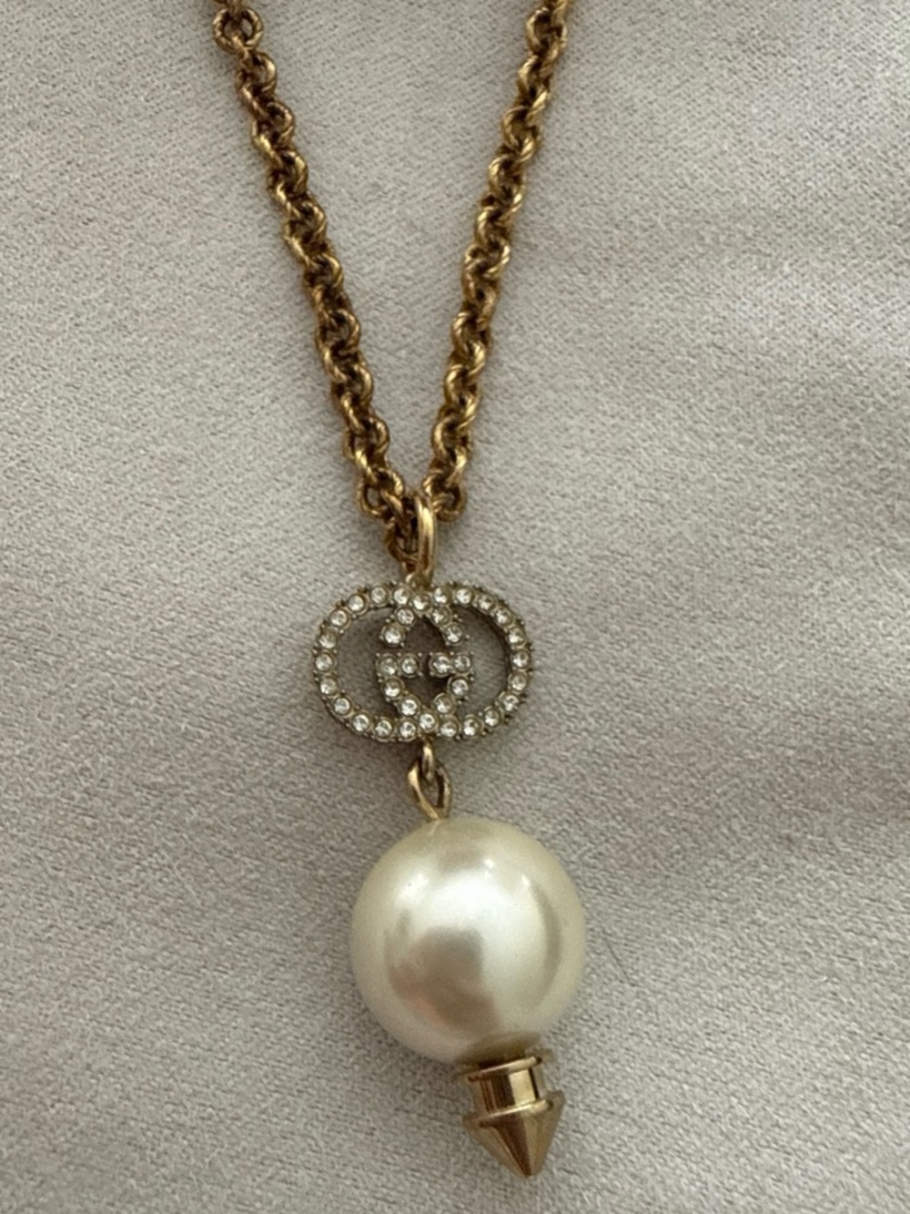 Gucci Gold-Tone Logo Necklace with Crystal Accents and Ivory Pearl Drop